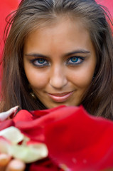 Fototapeta premium young women holding petals