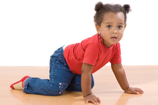 Adorable african baby crawl