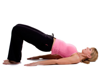 Woman doing yoga on white background