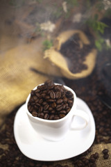 Coffee over dark roasted coffee beans