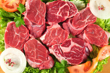 Raw meat and vegetables.