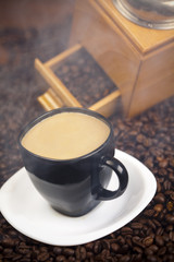 Coffee over dark roasted coffee beans