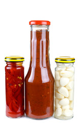 Jars with marinated piquant vegetables