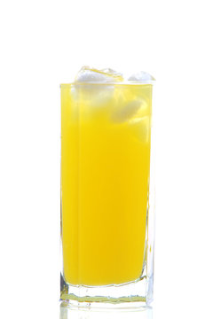 glass of cold orange juice with ices