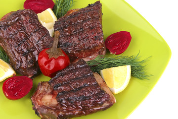 roast rib's on green dish