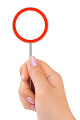 Circle traffic sign in hand