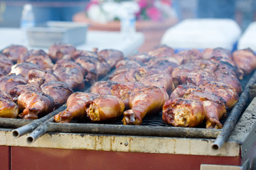 Barbecue smoked turkey drumsticks on the grill