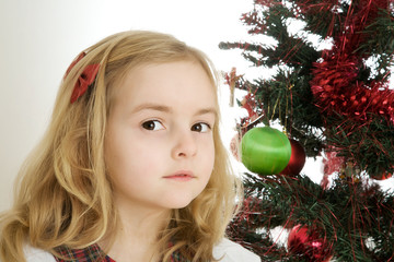 Kid and christmas tree