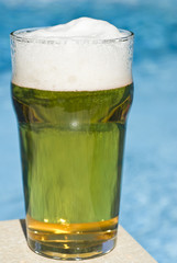 Glass of Beer by the Swimming Pool