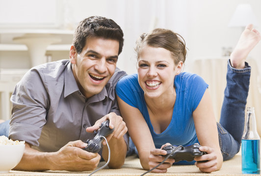Young Couple Playing Video Games