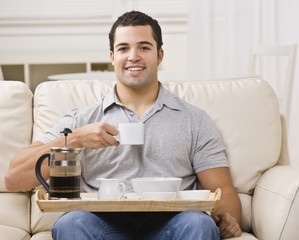 Man with Breakfast Tray and Coffee