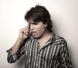 Man screaming at the phone