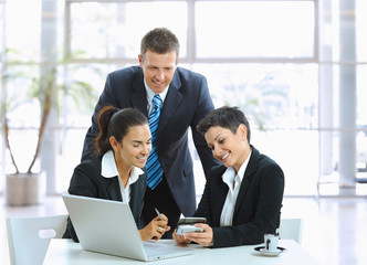 Casual meeting in office lobby