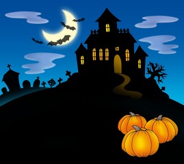 Haunted house with pumpkins