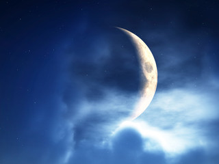 Fototapeta na wymiar Crescent Moon Through Clouds