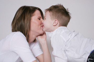 Mother and son rubbing noses