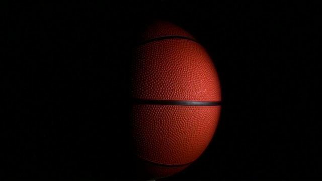 Basketball against black full seamless loop - HD