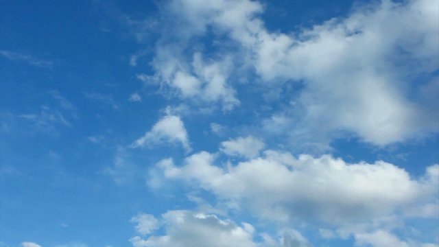 Time lapse movement of two layers of clouds