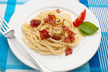 Pasta with fried bacon and vegetables