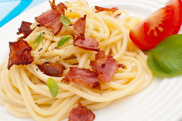 Pasta with fried bacon and vegetables