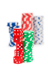 Stack of chips and dice isolated on the white background
