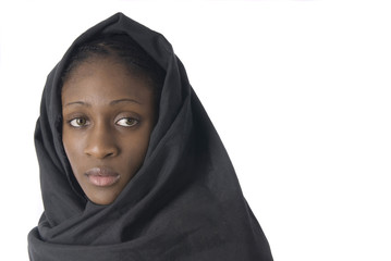 muslim woman with black veil in white background
