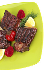 roast rib's on green dish