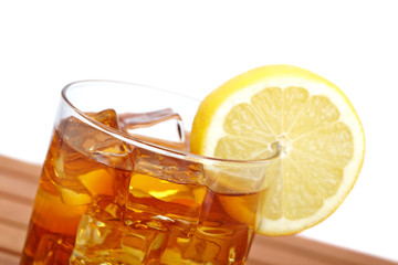 Glass of ice tea with lemon