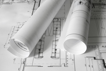 Rolled plans on the table