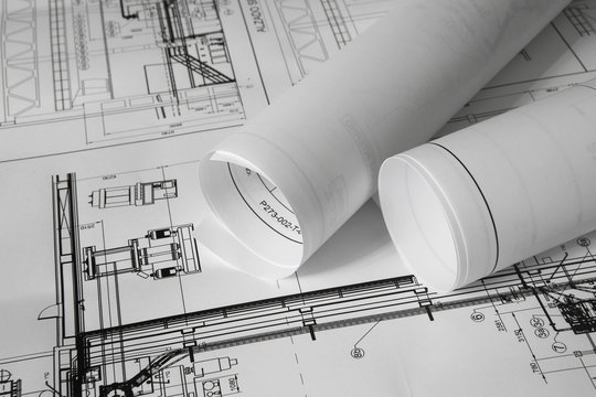 Rolled plans on the table