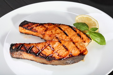 Grilled salmon on the white plate