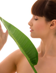 woman with green leaf