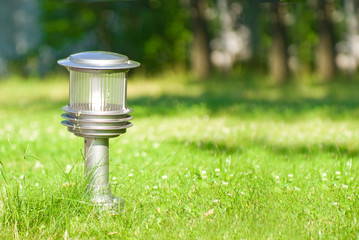 Lantern in the middle of a lawn