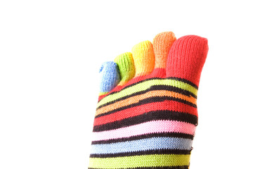 woman legs in strip sock on white background