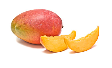 Mango and two segments isolated on white background