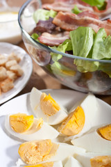 caesar salad with bacon and eggs