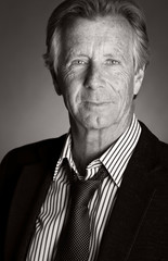 Fototapeta premium Black and White Shot of a Handsome Senior Business Man