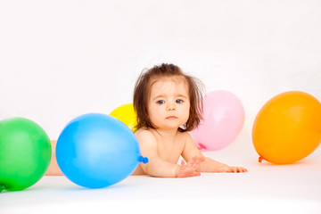 Fototapeta na wymiar baby with balloons birthday on colorful celebration party