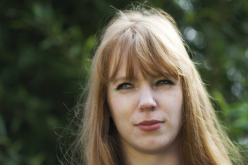 Naklejka premium Skeptical Redhead
