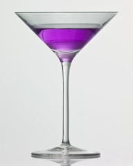 purple drink in cocktail glass