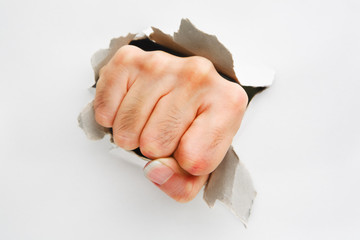 Fist breakthrough white wall