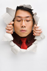 Man from hole looking down to empty space below