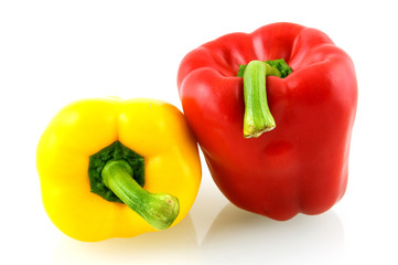 Yellow and red fresh paprika isolated on white background