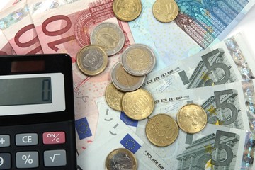 Euro money and calculator, as financial background