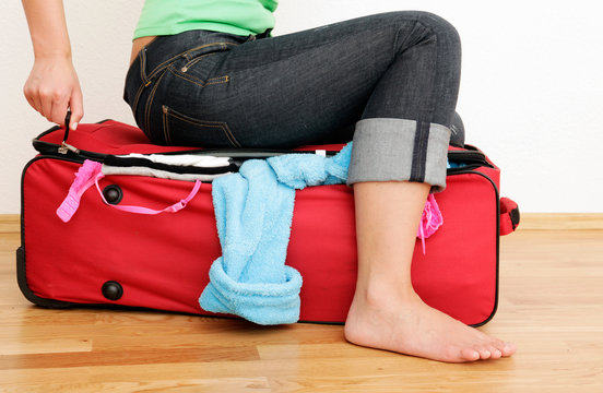 koffer packen und verreisen