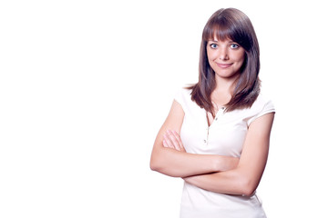 Fototapeta premium Young happy woman in white shirt. with hands near hip.