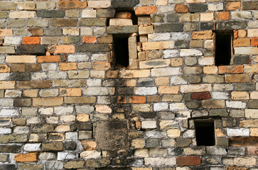 Ventilation holes on a brick wall in traditional chinese village