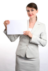 Businesswoman with sign