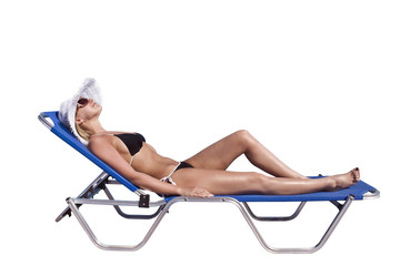 Young blond white woman on sunbed © Igor Sandra