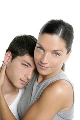 Beautiful young fresh modern couple hug on white